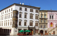 Místo neziskovek byty. Olomouc chystá rekonstrukci paláce na Dolním náměstí