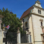 Václavské náměstí, kostel sv. Anny a průjezdová brána do areálu