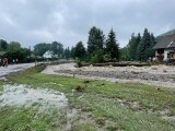 Silné deště rozvodnily řeku Bělou v Jeseníkách. Hasiči odčerpávají vodu ze zatopených sklepů, foto: HZS OLK